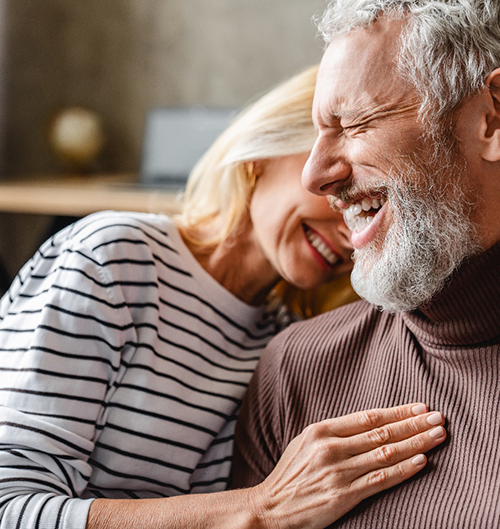 a mature couple laughing together in Des Plaines