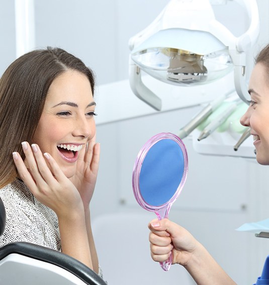 a patient visiting her dentist for treatment
