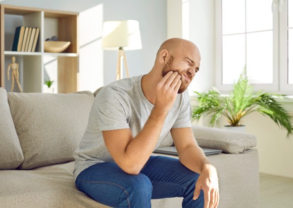 Patient in Mount Prospect holding their cheek