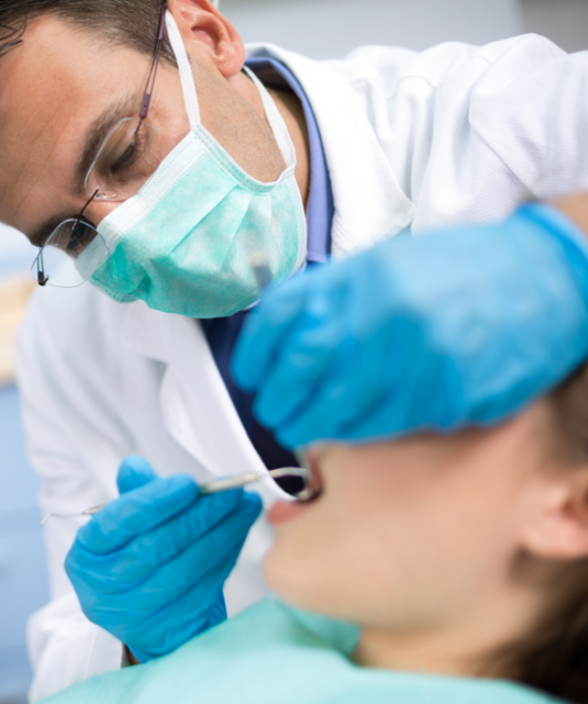 Dentist treating dental patient